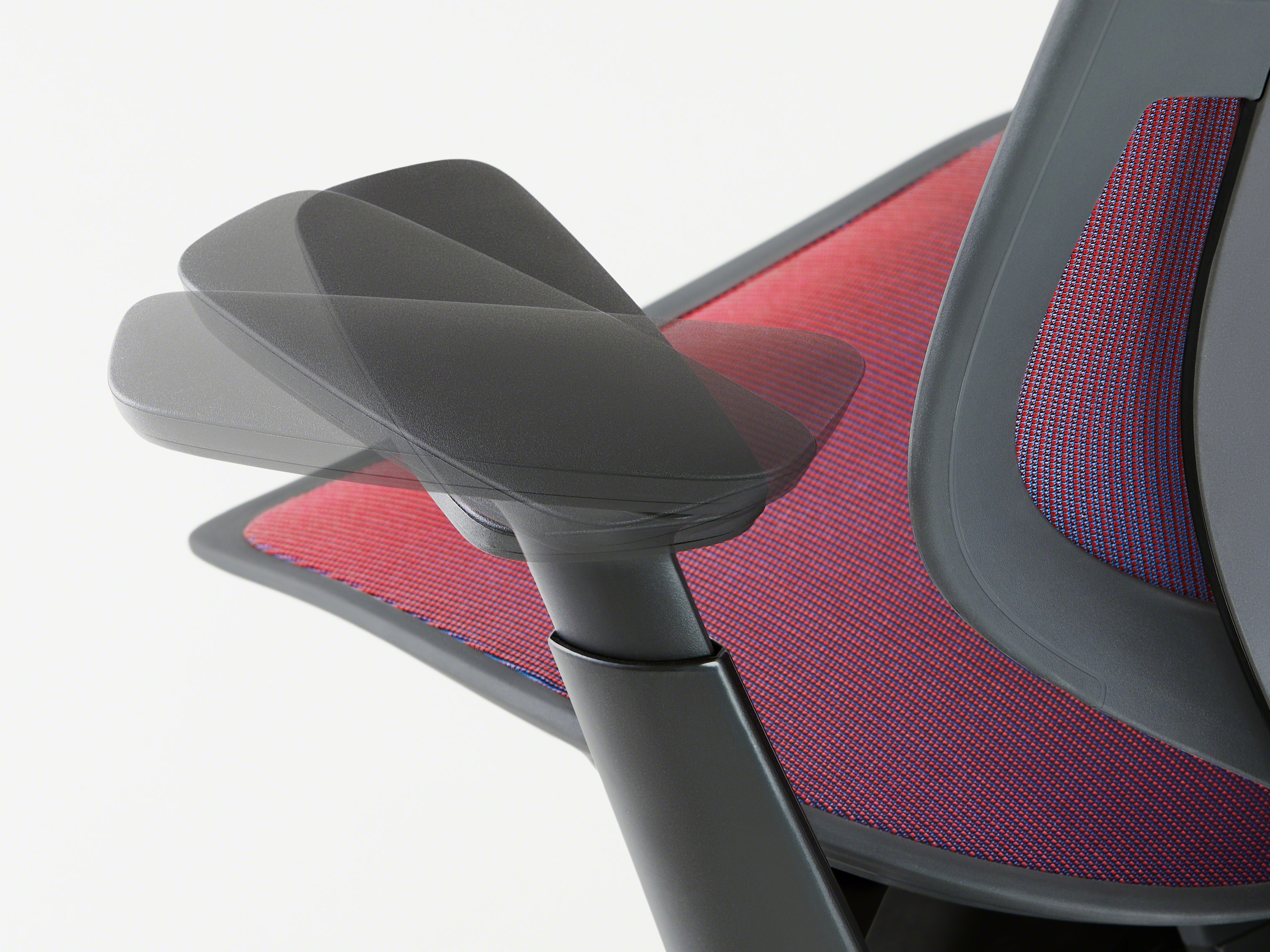 close up view to the arm rest of a Steelcase Karman chair